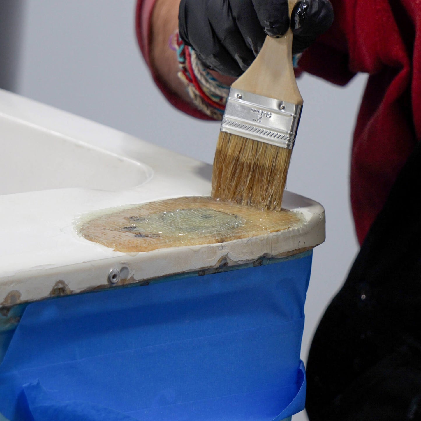 TotalBoat Traditional 5:1 Marine Epoxy Resin: Brushing over boat patch