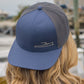 TotalBoat Retro Trucker Hat Worn Backwards by Woman