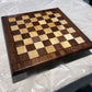 TotalBoat Wood Honey on a finished wood chess board